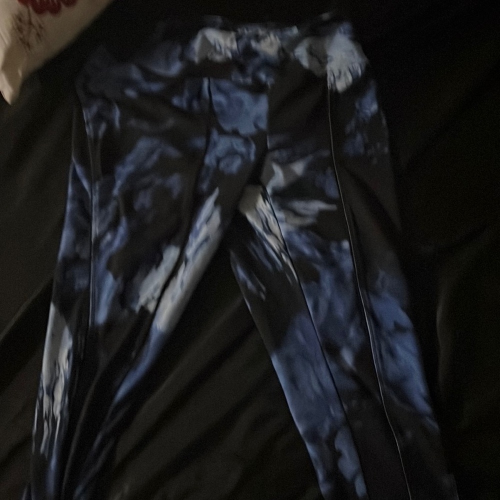 Size extra small colorful blue and black leggings. Used.